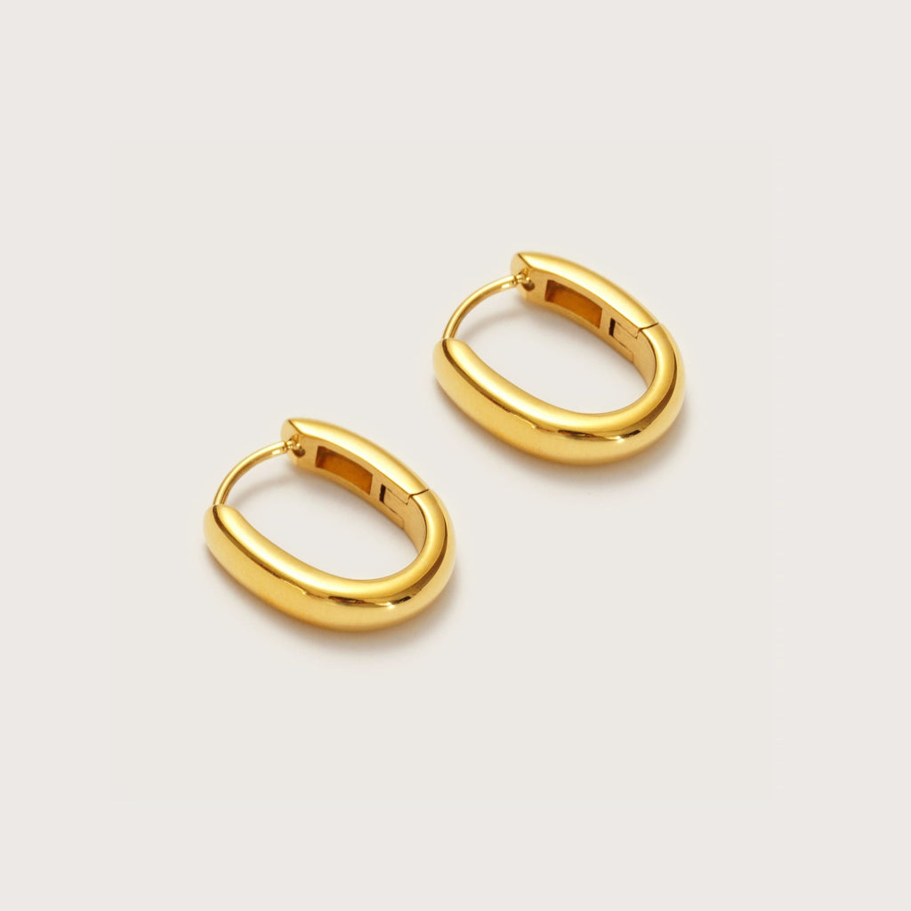 Gold Oval Huggies close-up showing oval shape profile