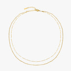 Noelle Jewelry gold double beaded choker, flat lay