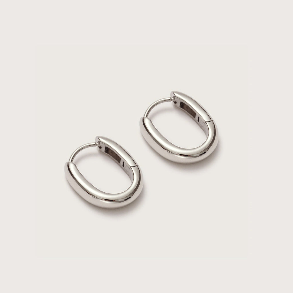Silver Oval Huggies close-up showing oval hoop design