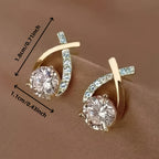 Earrings with golden cross and zirconia