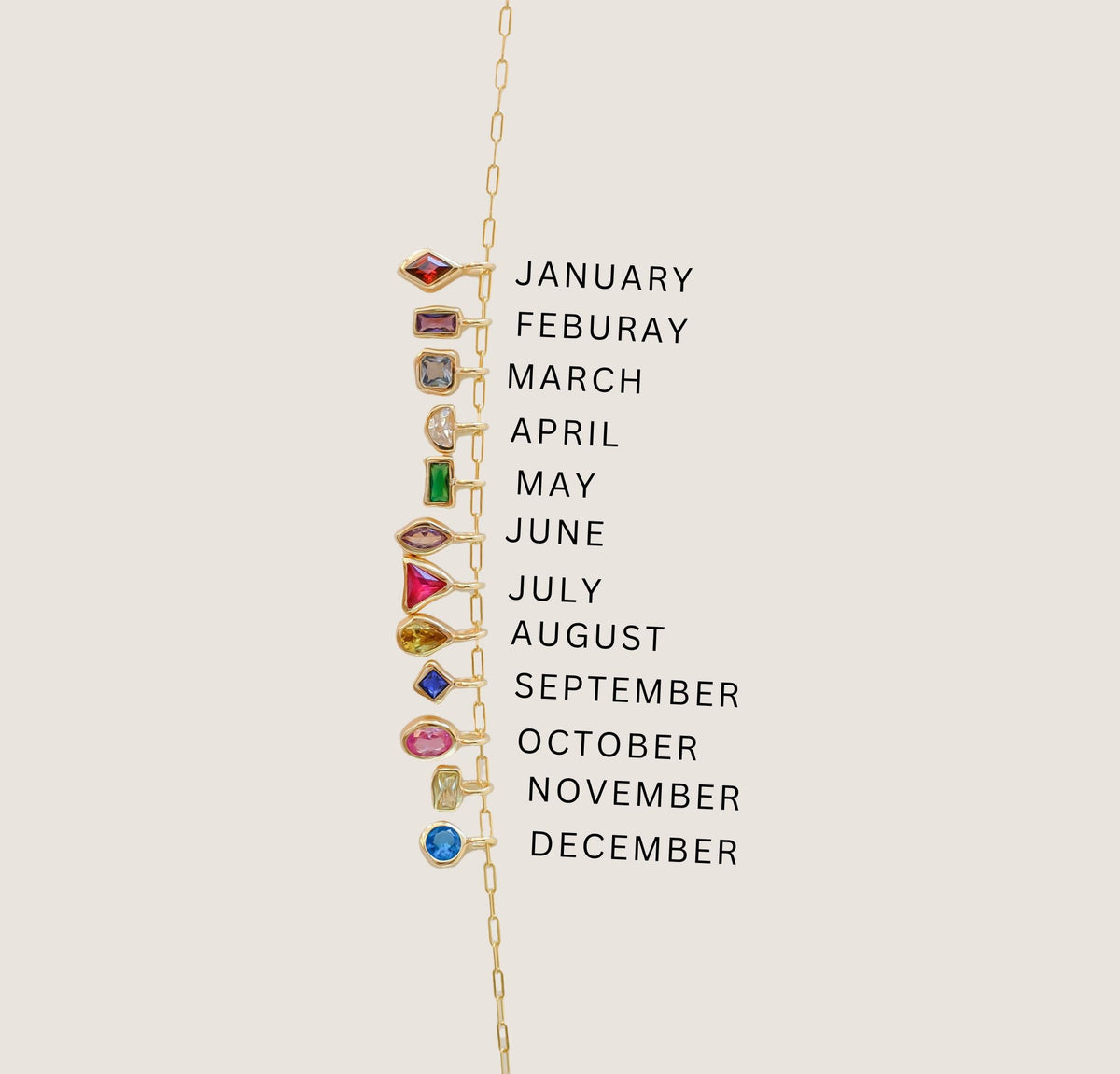 The LLUME Jewelry Build a Birthstone Necklace features a gold chain with twelve gold-plated charms, each displaying a unique birthstone for every month, aligned vertically beside the months January to December in black text.