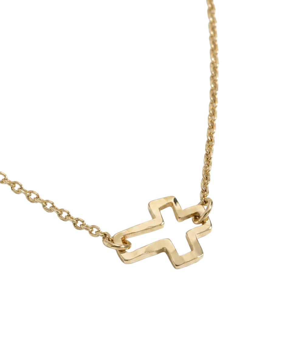Delicate gold rolo chain necklace with tiny open cross pendant