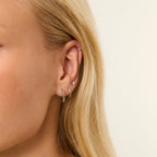 Silver Bobble Huggies styled on ear