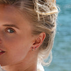Silver Ultimate Huggies 8mm worn in lifestyle setting