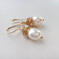 Vintage earrings with pearls and golden threads